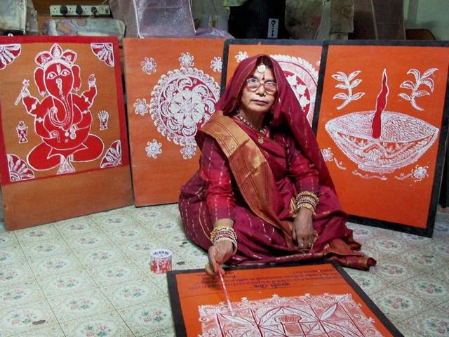 Koshilya Devi has till now painted over 100 designs in the Mandana style on hardboard using oil paints.(PTI)