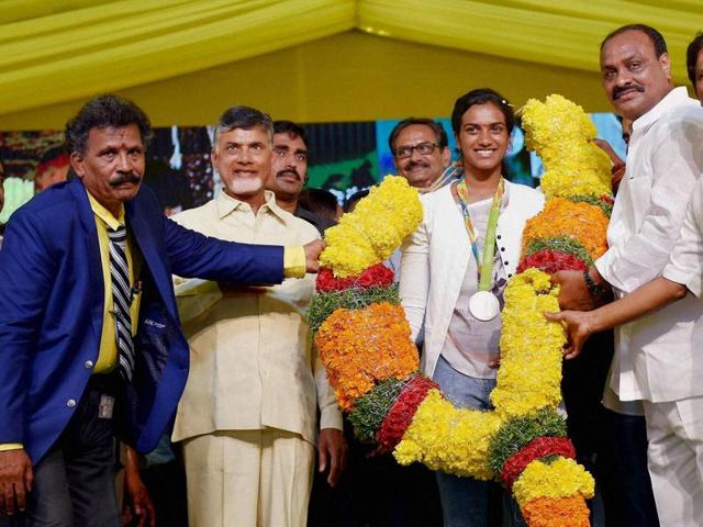 Chief Minister of Andhra Pradesh N Chandrababu Naidu felicitates PV Sindhu in Vijayawada. (PTI) Chief Minister of Andhra Pradesh N Chandrababu Naidu felicitates PV Sindhu in Vijayawada. (PTI)