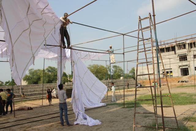 Residents of Mokhar village raising a tent to honour Olympic medal winner Sakshi Malik at her native on Tuesday. (Manoj Dhaka/HT photo)