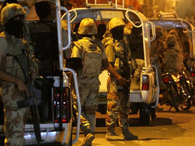 Soldiers cordon-off an area outside offices of the Muttahida Qaumi Movement, or MQM, in Karachi, Pakistan. (AP Photo) Soldiers cordon-off an area outside offices of the Muttahida Qaumi Movement, or MQM, in Karachi, Pakistan. (AP Photo)