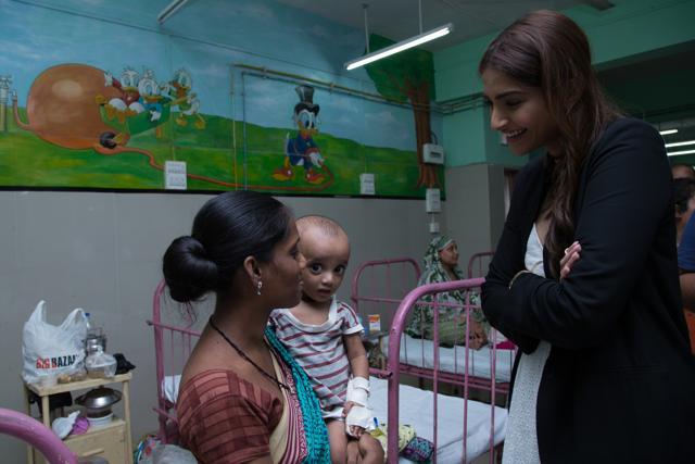 Sonam interacts with 10-month-old Silvan at a hospital in Sion, Mumbai Sonam interacts with 10-month-old Silvan at a hospital in Sion, Mumbai