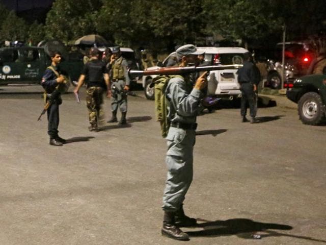 Afghan policemen stand guard at the site of an attack at American University of Afghanistan in Kabul. (Reuters Photo) Afghan policemen stand guard at the site of an attack at American University of Afghanistan in Kabul. (Reuters Photo)