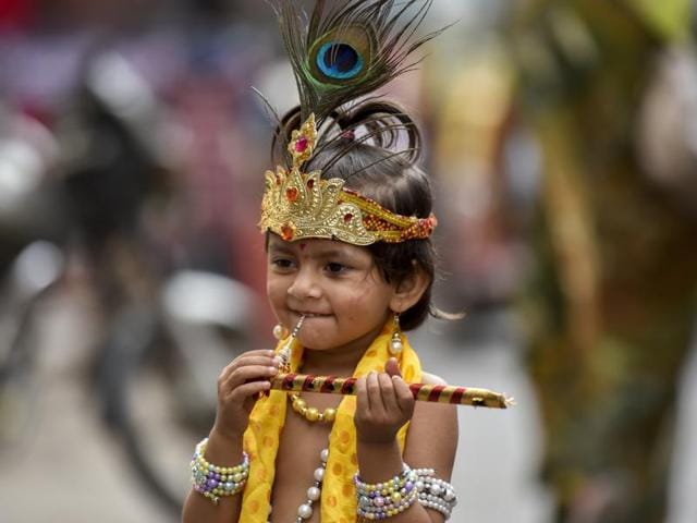 A child dressed as Lord Krishna during the Gopal Kala celebrations at Dadar on Thursday. (Kunal patil/HT ) 