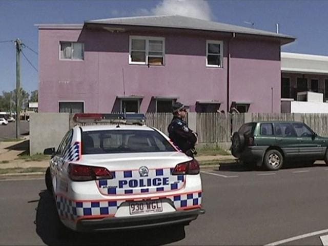 Authorities at the crime scene after a stabbing at a hostel in the town of Home Hill in northern Queensland, Australia. (ABC via AP Photo) Authorities at the crime scene after a stabbing at a hostel in the town of Home Hill in northern Queensland, Australia. (ABC via AP Photo)