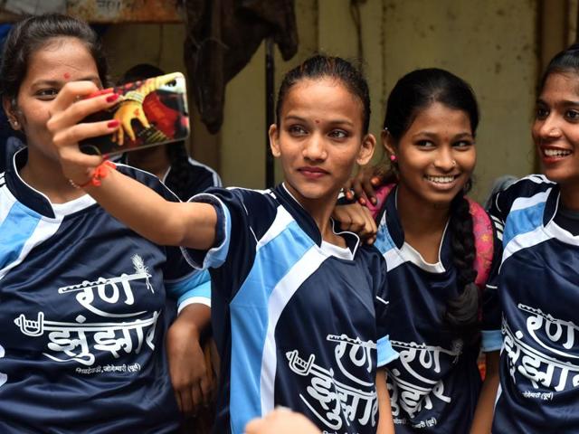 Woman govindas take selfies in Mumbai on Thursday. (Vidya Subramanian/HT ) 