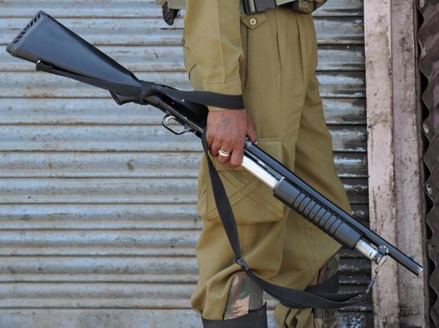 A security official holds a pellet gun during clashes with protestors in Srinagar on July 23, 2016.(AFP file photo)