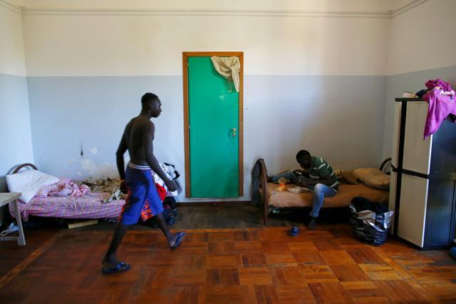 Migrants are seen in their room at an immigration centre in the Sicilian town of Caltagirone, Italy, on April 20, 2016. (Reuters) Migrants are seen in their room at an immigration centre in the Sicilian town of Caltagirone, Italy, on April 20, 2016. (Reuters)