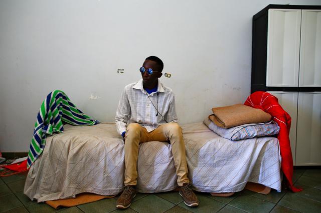 A migrant sits on his bed at an immigration centre in the Sicilian town of Caltagirone, Italy, on April 20, 2016. (Reuters) A migrant sits on his bed at an immigration centre in the Sicilian town of Caltagirone, Italy, on April 20, 2016. (Reuters)