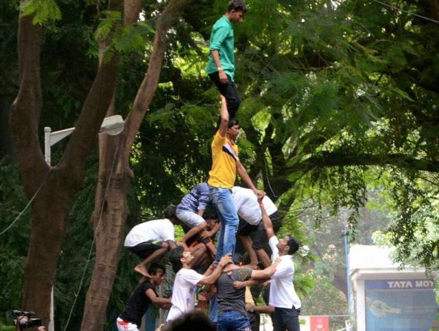 People make a human pyramid to protest against Supreme Court's order on restrictions on the Dahi Handi ritual, in Mumbai.(PTI File Photo)