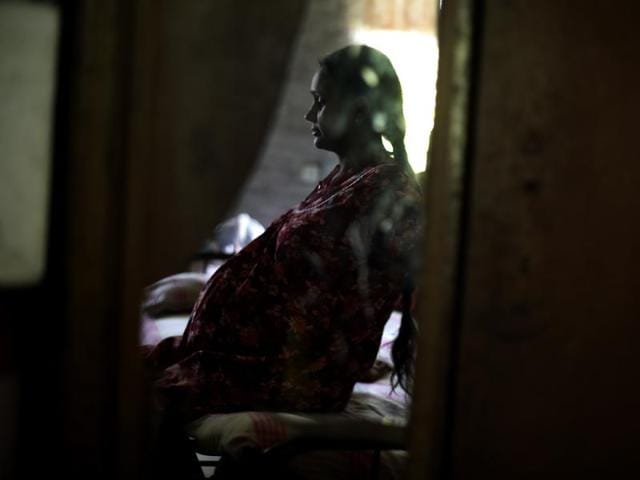 A surrogate mother at the surrogate house in Anand in Gujarat, India. Most women say they choose to do surrogacy because as daily wagers , they are unable to make ends meet.(Ravi Choudhary/Hindustan Times)