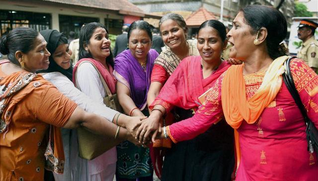 Bharatiya Muslim Mahila Andolan members celebrate after the Mumbai high court ruled that women can enter the inner sanctum of the Haji Ali Dargah in Mumbai on Friday. (PTI)