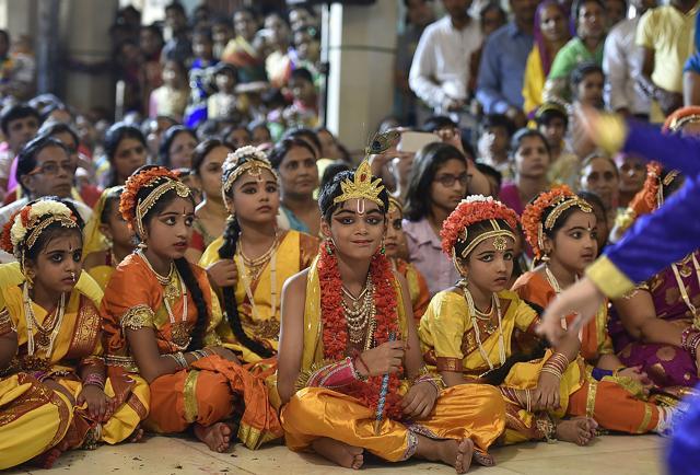 Children dressed as Lord Krishna and Radha at Birla Mandir in New Delhi on Thursday (Raj K Raj/HT Photo) Children dressed as Lord Krishna and Radha at Birla Mandir in New Delhi on Thursday (Raj K Raj/HT Photo)
