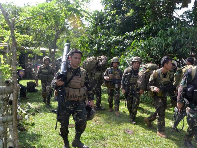 Philippine troops kill 11 militants of Abu Sayyaf kidnapping gang ...