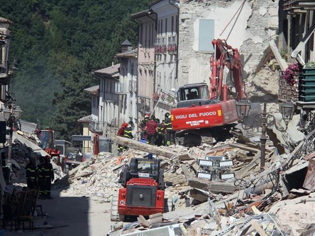 Rescuers work at a collapsed house following an earthquake in Amatrice, central Italy. (Reuters) Rescuers work at a collapsed house following an earthquake in Amatrice, central Italy. (Reuters)