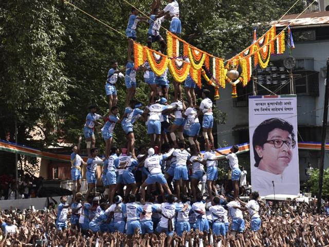 Govindas from Jai Jawan Govinda Pathak group form a 9 layers pyramid at MNS Handi Bhagwati School ground in Thane. (Satish Bate/HT PHOTO) Govindas from Jai Jawan Govinda Pathak group form a 9 layers pyramid at MNS Handi Bhagwati School ground in Thane. (Satish Bate/HT PHOTO)