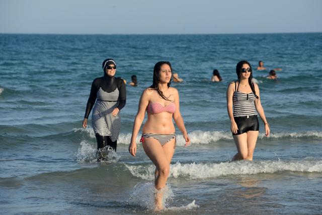 Opponents decry the burkini ban as a hideous human rights violation that has no place in a country that prides itself on its democratic values.(Reuters)