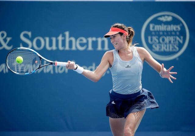 Garbiñe Muguruza of Spain hits a retun in her quarterfinal match against Timea Babos. (AFP Photo) Garbiñe Muguruza of Spain hits a retun in her quarterfinal match against Timea Babos. (AFP Photo)