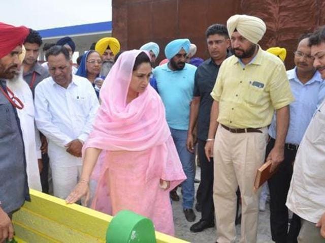 Union minister Harsimrat Kaur Badal and OSD Harendra Sra (yellow turban) checking the benches which were distributed during a sangat darshan in Mansa.(HT File Photo) Union minister Harsimrat Kaur Badal and OSD Harendra Sra (yellow turban) checking the benches which were distributed during a sangat darshan in Mansa.(HT File Photo)