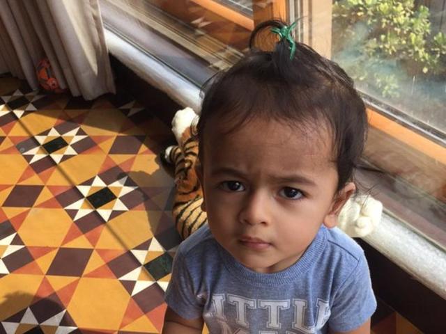 Riaan, Riteish’s two-year-old son poses for dad. (Twitter)
