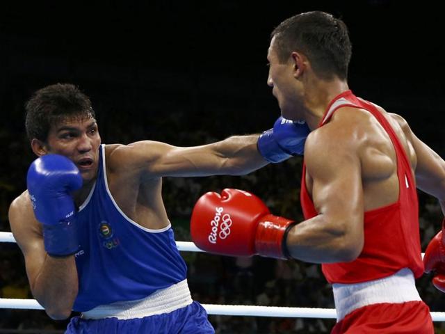 India's Vikas Krishan, right, fights Turkey's Onder Sipal during a men's middleweight 75-kg preliminary boxing match. (AP Photo) India's Vikas Krishan, right, fights Turkey's Onder Sipal during a men's middleweight 75-kg preliminary boxing match. (AP Photo)