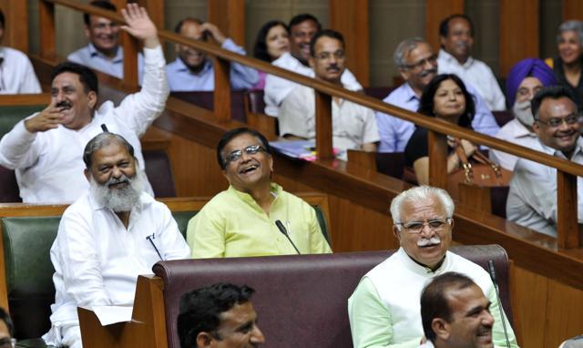Chief minister Manohar Lal Khattar, other ministers having a hearty laugh at the event. (Keshav Singh/HT Photo) Chief minister Manohar Lal Khattar, other ministers having a hearty laugh at the event. (Keshav Singh/HT Photo)