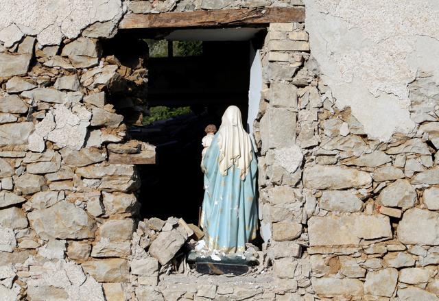 A Virgin Mary statue is seen in a church following an earthquake at Cossito near Amatrice, central Italy. (Reuters) A Virgin Mary statue is seen in a church following an earthquake at Cossito near Amatrice, central Italy. (Reuters)