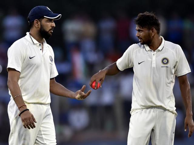 Yuvraj Singh handing over the ball to team bowler Nathu Singh during the match against India Green. (Mohd Zakir/HT PHOTO) Yuvraj Singh handing over the ball to team bowler Nathu Singh during the match against India Green. (Mohd Zakir/HT PHOTO)