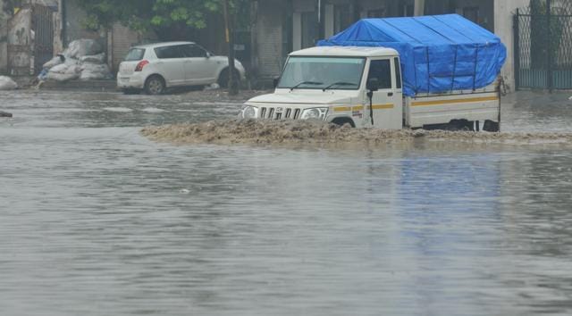 A waterlogged road in Jalandhar on Saturday. (Pardeep Pandit/HT Photo)