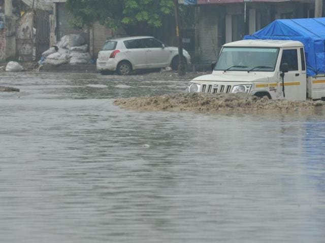 A waterlogged road in Jalandhar on Saturday. (Pardeep Pandit/HT Photo)