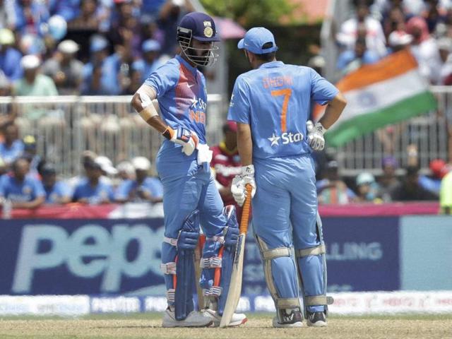 India's Lokesh Rahul, left, and MS Dhoni (7) talks in between overs. (AP Photo) India's Lokesh Rahul, left, and MS Dhoni (7) talks in between overs. (AP Photo)