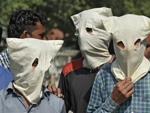 The three men arrested for the murder of constable Anand Singh, on Saturday. (Ravi Choudhary/Hindustan Times) The three men arrested for the murder of constable Anand Singh, on Saturday. (Ravi Choudhary/Hindustan Times)