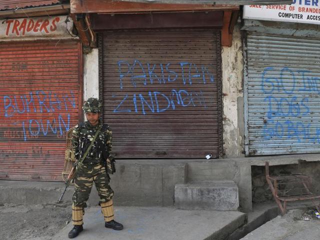 A soldier stands guard during a curfew in downtown Srinagar. (Waseem Andrabi/ HT file) A soldier stands guard during a curfew in downtown Srinagar. (Waseem Andrabi/ HT file)