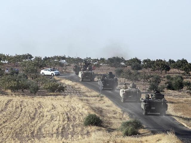 Turkish troops head to the Syrian border, in Karkamis, Turkey, on Saturday. (AP Photo) Turkish troops head to the Syrian border, in Karkamis, Turkey, on Saturday. (AP Photo)