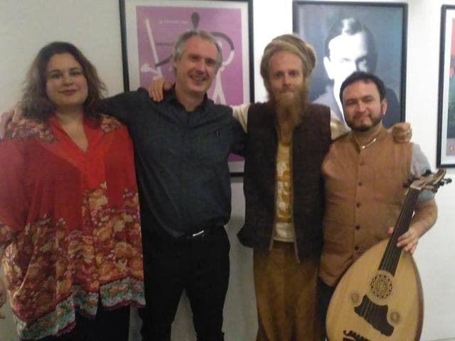 Paul MacAlindin (second from left), the conductor of the Iraqi band, poses for a photo with his team members. (Twitter) Paul MacAlindin (second from left), the conductor of the Iraqi band, poses for a photo with his team members. (Twitter)