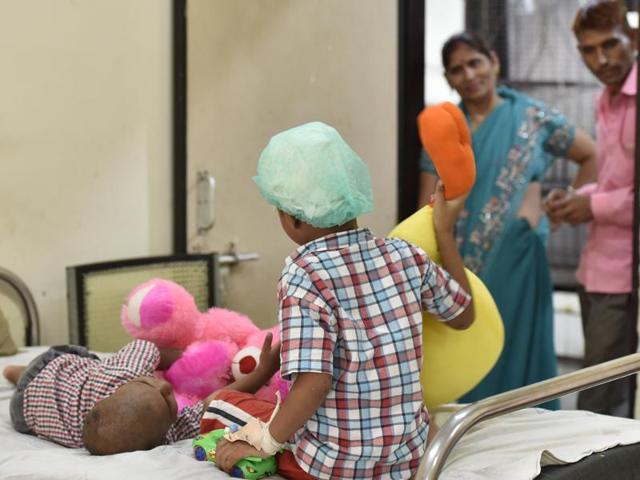 Eight-year- old Himanshi (R) along with her sister Deepali at Ambedkar Hospital, New Delhi. The girls were found abandoned at their home in Samaypur Badli on Friday, August 26, 2016. (Sanjeev Verma/HT Photo) Eight-year- old Himanshi (R) along with her sister Deepali at Ambedkar Hospital, New Delhi. The girls were found abandoned at their home in Samaypur Badli on Friday, August 26, 2016. (Sanjeev Verma/HT Photo)