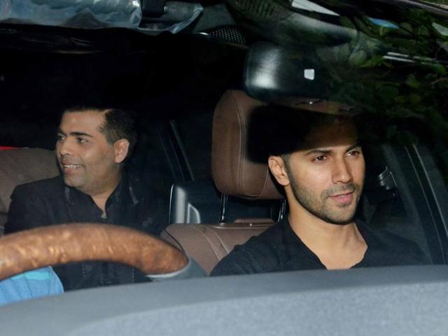 Varun Dhawan and Karan Johar share a car as they arrive for Akshay’s bash. (Yogen Shah)