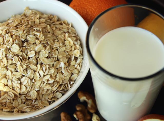 Glass of milk and a plate of oatmeal. (Getty Images/iStockphoto)