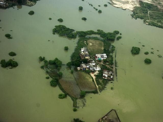This aerial view shows flooding in low lying areas on the outskirts of Allahabad on August 25, 2016.(AFP) This aerial view shows flooding in low lying areas on the outskirts of Allahabad on August 25, 2016.(AFP)