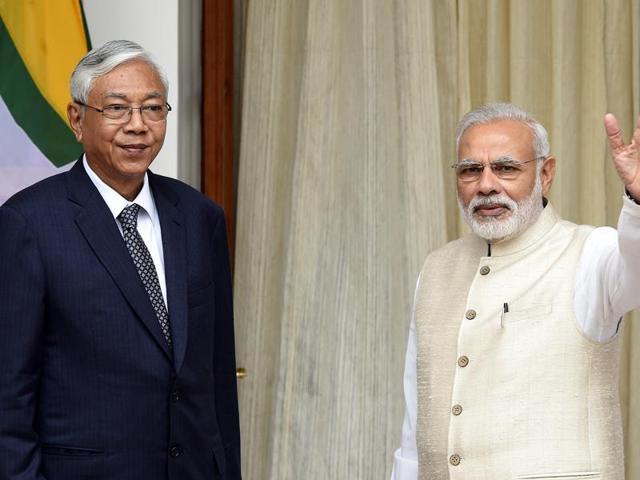 Prime Minister Narendra Modi (R) waves as he receives Myanmar President U Htin Kyaw at Hyderabad House in Delhi on August 29. (Sonu Mehta/HT PHOTO) Prime Minister Narendra Modi (R) waves as he receives Myanmar President U Htin Kyaw at Hyderabad House in Delhi on August 29. (Sonu Mehta/HT PHOTO)