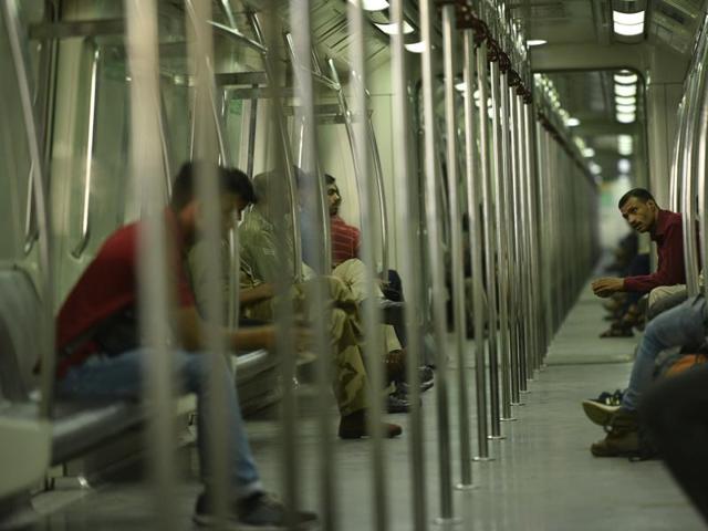 Passengers travelling by the Blue Line Metro train carriage, which runs from Dwarka to Vaishali in New Delhi on Monday. (Arun Sharma/HT ) 