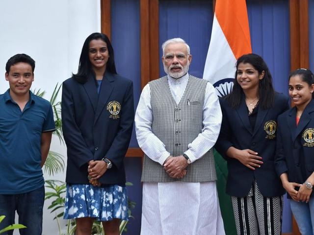 Prime Minister Narendra Modi poses with Olympic Medal Winners, Khel Ratna Awardees in New Delhi . (PTI Photo) Prime Minister Narendra Modi poses with Olympic Medal Winners, Khel Ratna Awardees in New Delhi . (PTI Photo)