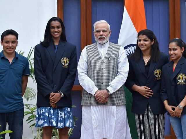 Prime Minister Narendra Modi poses with Olympic Medal Winners, Khel Ratna Awardees in New Delhi. (PTI Photo) Prime Minister Narendra Modi poses with Olympic Medal Winners, Khel Ratna Awardees in New Delhi. (PTI Photo)