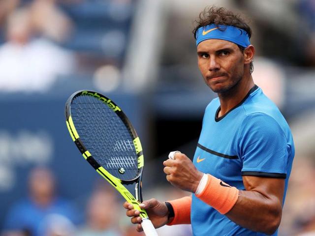 Rafael Nadal of Spain reacts during his first round Men's Singles match against Denis Istomin. (AFP photo) 