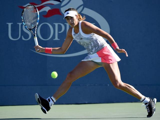 Garbiñe Muguruza of Spain returns a shot to Elise Mertens of Belgium. (AFP photo) 