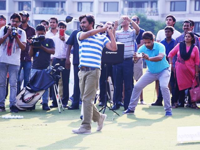 Nawazuddin with Sidharth Arora, the man who he says taught him golf just a week before the shoot. Nawazuddin with Sidharth Arora, the man who he says taught him golf just a week before the shoot.