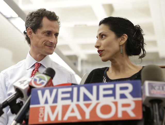 Huma Abedin, alongside her husband, then-New York mayoral candidate Anthony Weiner. (AP File Photo) Huma Abedin, alongside her husband, then-New York mayoral candidate Anthony Weiner. (AP File Photo)