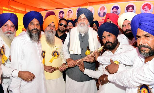 Badal being honoured at the rally. (HT Photo)