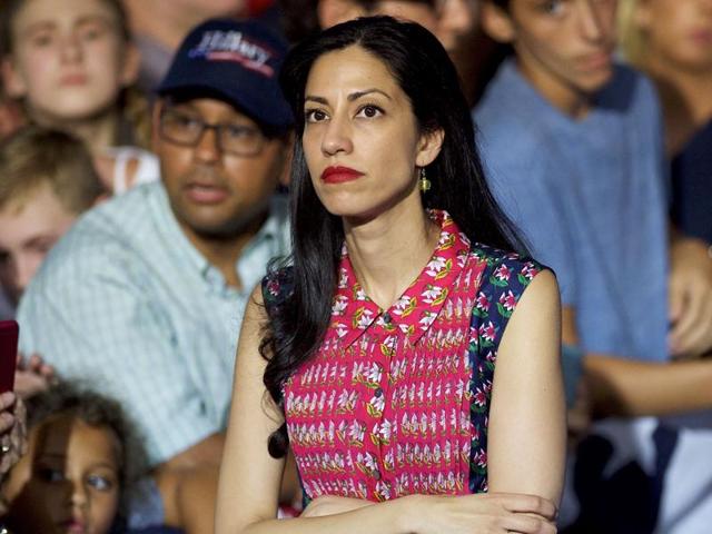 Long-time Hillary Clinton staff member Huma Abedin waits while the Democratic Presidential nominee greets supporters after holding a rally with Joe Biden at Riverfront Sports athletic facility in Scranton, Pennsylvania. (AFP File Photo) Long-time Hillary Clinton staff member Huma Abedin waits while the Democratic Presidential nominee greets supporters after holding a rally with Joe Biden at Riverfront Sports athletic facility in Scranton, Pennsylvania. (AFP File Photo)