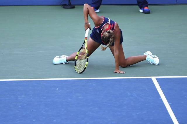 Monica Puig of Puerto Rico competes against Saisai Zheng of China. (AP Photo) Monica Puig of Puerto Rico competes against Saisai Zheng of China. (AP Photo)