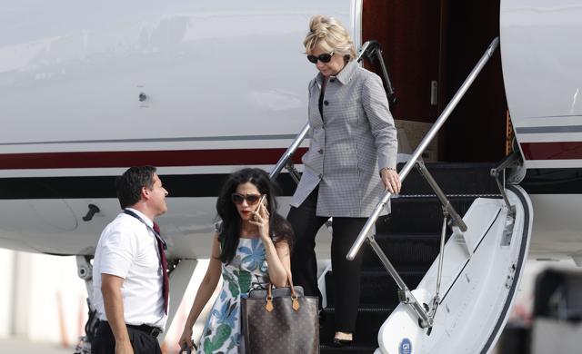 Democratic presidential nominee Hillary Clinton and aide Huma Abedin at Van Nuys Airport in Van Nuys, California. (AP Photo) Democratic presidential nominee Hillary Clinton and aide Huma Abedin at Van Nuys Airport in Van Nuys, California. (AP Photo)